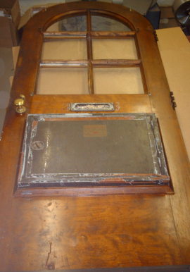 photo of door before restoration