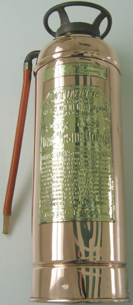 Photo of copper and brass fire extinguisher after metal restoration