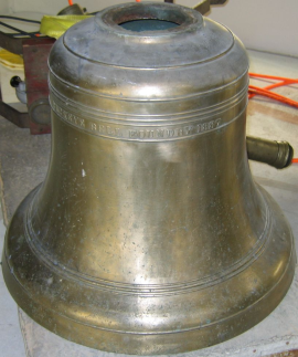 Photo of antique bell before restoration