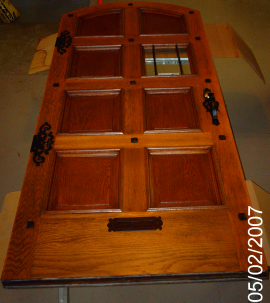 photo of door after metal & wood restoration