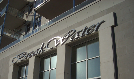 Photo of stainless steel sign we fabricated and finished.
